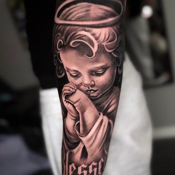 Cherub portrait tattoo with soft shading