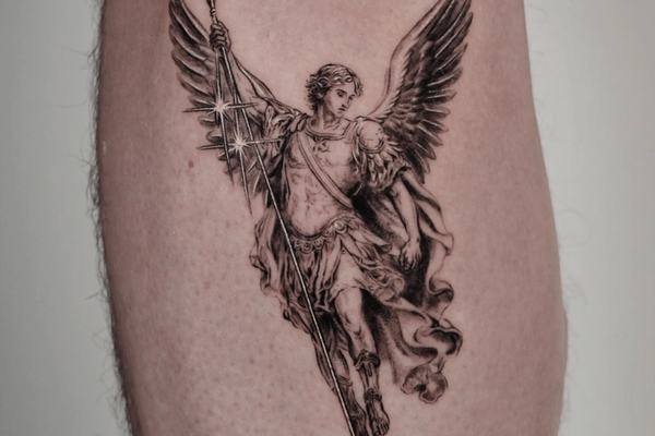 Archangel tattoo with spear and wings