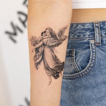 Fine detailed angel tattoo on the forearm