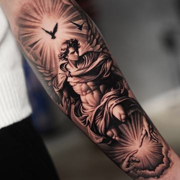 Detailed guardian angel tattoo on the forearm