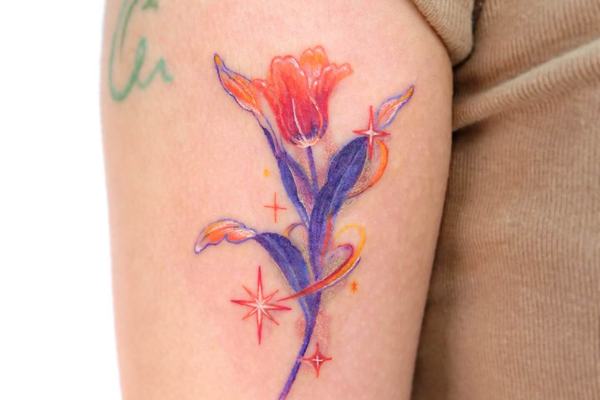 Colorful tulip tattoo with bright botanical details