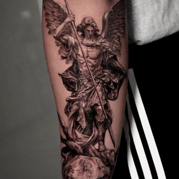 Archangel tattoo with wings and armor