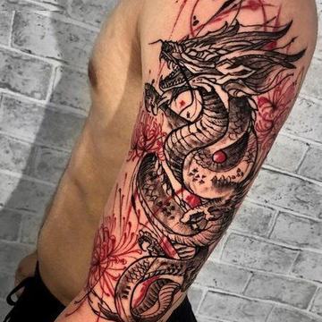 Dragon leg tattoo with red line details